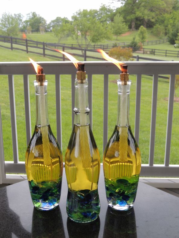 great outdoor lighting, great lighting for Daylight savings, DIY outdoor lights, DIY wine bottle tiki torches, DIY tutorial