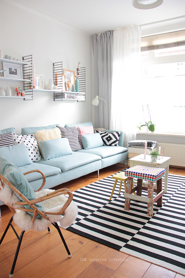 IDA interior lifestyle - Pastel couch - graphic print - soft accents - pretty pastels - Mohawk Homespaces