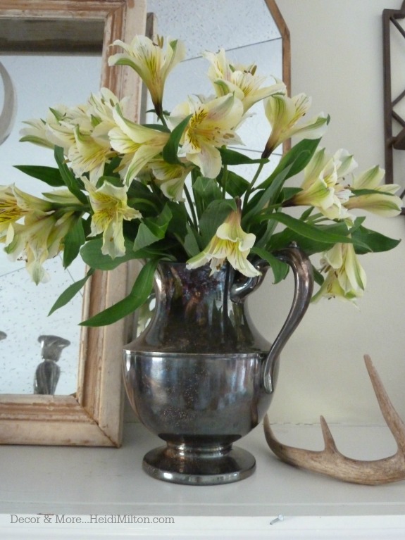 pitcher with flowers