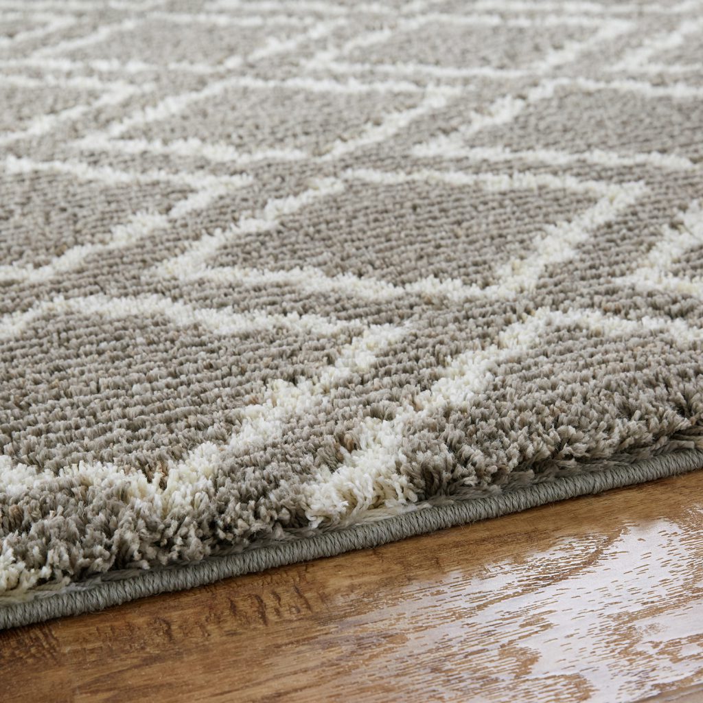 Photo of the plush pile of Mohawk Home's Magicfret Area Rug in Gray from the Laguna Collection