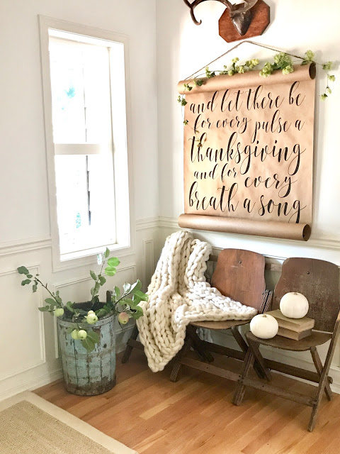 Rustic farmhouse entryway with beautiful Thanksgiving decor