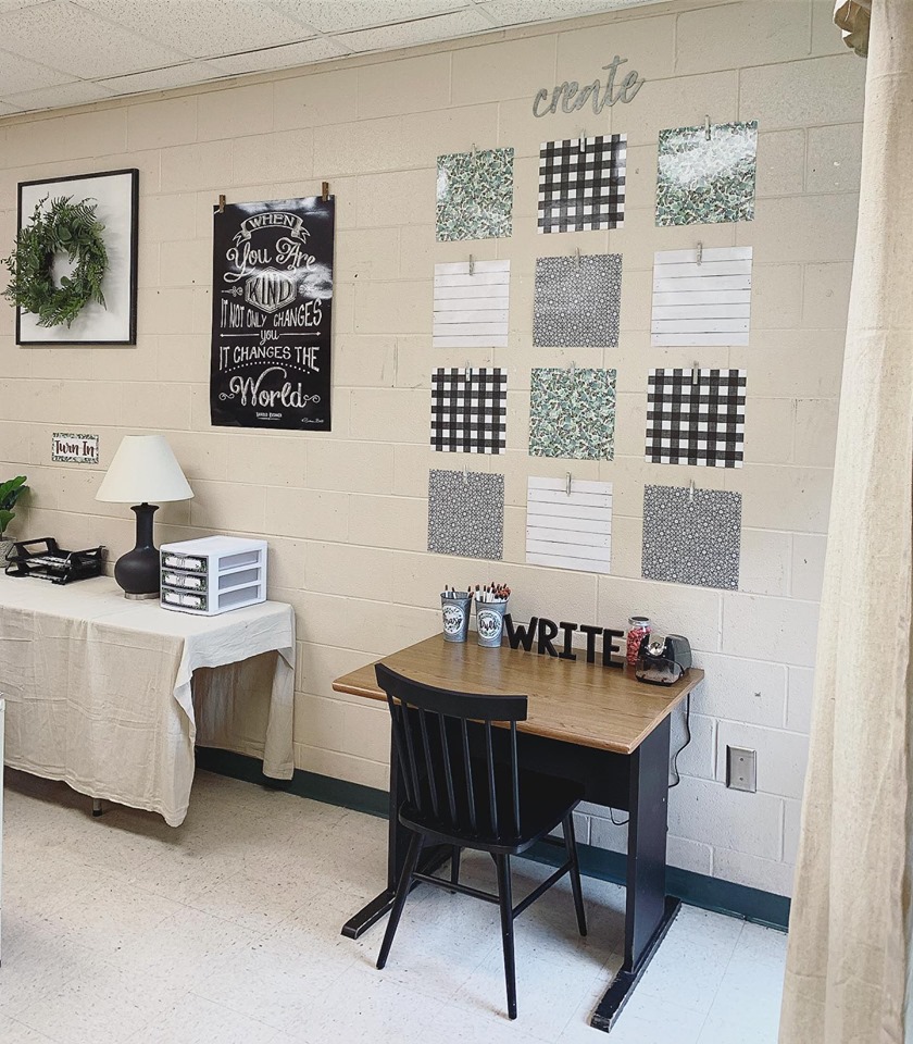 Writing desk with tin bucket pencil holders and an 'outstanding work' wall display using farmhouse scrapbook paper