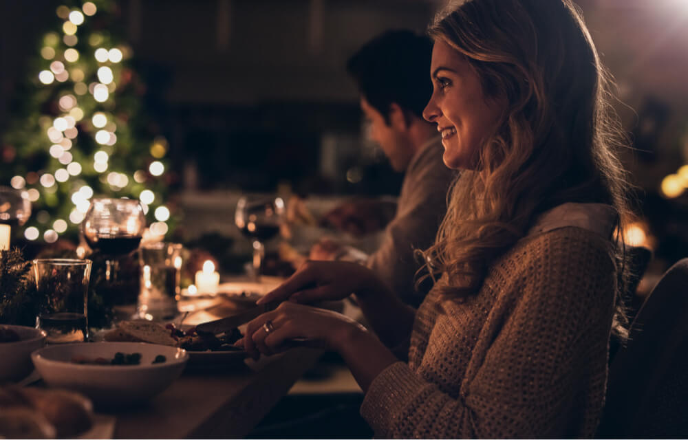 Woman enjoying Christmas dinner